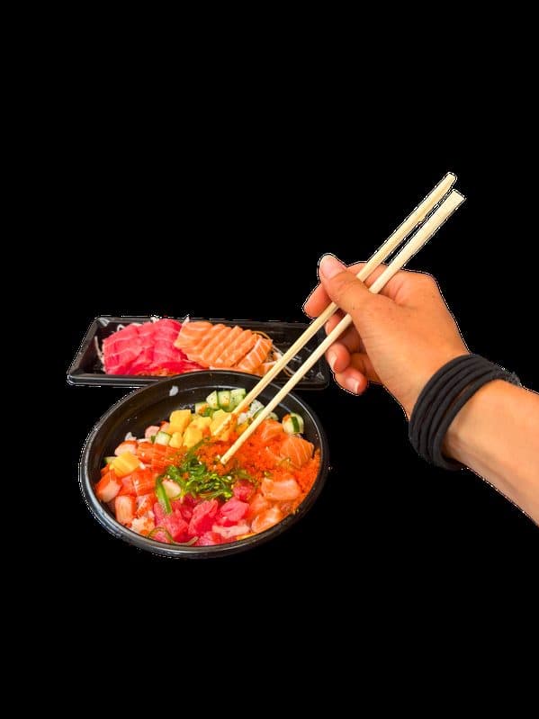 A colorful poke bowl shot on a dark background